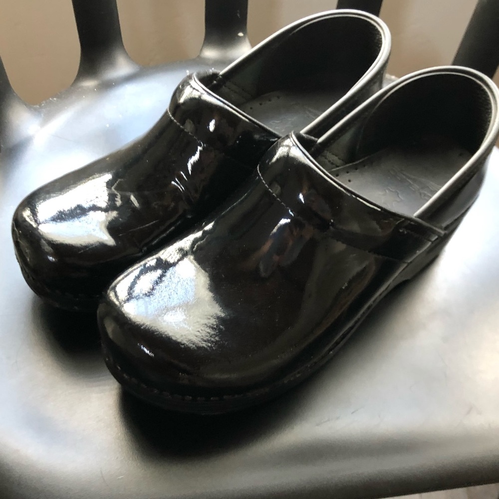 Dansko patent leather clogs